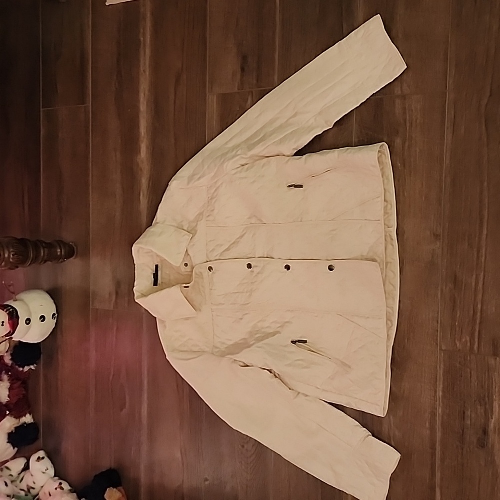 Jane Ashley cream colored quilted jacket.